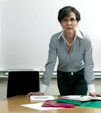 Business woman by table